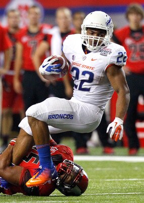 ATLANTA, GA - SEPTEMBER 03:  Doug Martin #22 of the Boise State Broncos is tackled by Christian Robinson #45 of the Georgia Bulldogs at Georgia Dome on September 3, 2011 in Atlanta, Georgia.  (Photo by Kevin C. Cox/Getty Images)