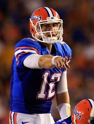 GAINESVILLE, FL - SEPTEMBER 10:  John Brantley #12 of the Florida Gators points during a game against the UAB Blazers at Ben Hill Griffin Stadium on September 10, 2011 in Gainesville, Florida.  (Photo by Sam Greenwood/Getty Images)