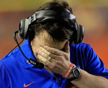 GAINESVILLE, FL - SEPTEMBER 10:  Head coach Will Muschamp of the Florida Gators wipes his face during a game against the UAB Blazers  at Ben Hill Griffin Stadium on September 10, 2011 in Gainesville, Florida.  (Photo by Sam Greenwood/Getty Images)