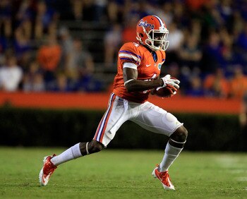 GAINESVILLE, FL - SEPTEMBER 03:  Andre Debose #4 of the University of Florida Gators runs for yardage during a game against the Florida Atlantic University Owls at Ben Hill Griffin Stadium on September 3, 2011 in Gainesville, Florida.  (Photo by Sam Green