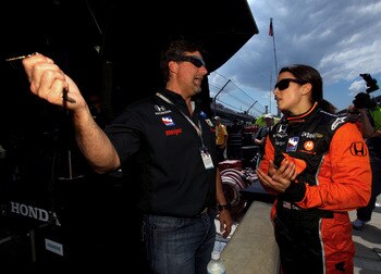 INDIANAPOLIS - MAY 22:   Team Owner Michael Andretti speaks with Danica Patrick, driver of the #7 Boost Mobile/Motorola Andretti Green Racing, during Miller Lite Carb Day practice for the IRL IndyCar Series 93rd running of the Indianapolis 500 on May 22,