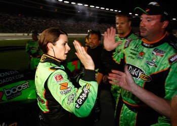 FORT WORTH, TX - JUNE 05:  Danica Patrick, driver of the #7 Team Godaddy.com Andretti Autosport Dallara Honda, celebrates her second place finish with teammates in the IZOD IndyCar Series Firestone 550k at Texas Motor Speedway June 5, 2010 in Fort Worth,