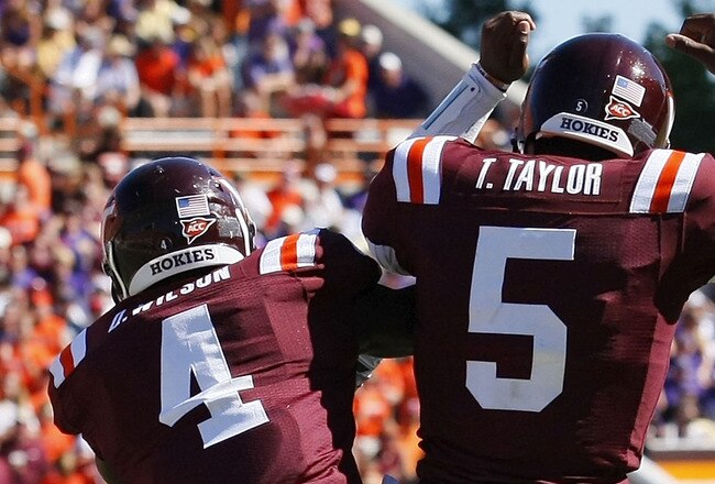 BLACKSBURG, VA - SEPTEMBER 18:  Running back David Wilson #4 and quarterback Tyrod Taylor #5 of the Virgina Tech Hokies celebrate after Wilson scored a touchdown against the East Carolina Pirates at Lane Stadium on September 18, 2010 in Blacksburg, Virgin