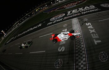 FORT WORTH,TX- JUNE 9: Sam Hornish Jr. driver of the #6 Team Penske Dallara Honda, leads Tony Kanaan driver of  the #11 Team 7-Eleven Andretti Green Racing Dallara Honda, and Danica Patrick driver of the #7 Motorola Andretti Green Racing Dallara Honda, at