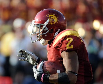 LOS ANGELES, CA - SEPTEMBER 10:  Robert Woods #2 of the USC Trojans returns a kick against the Utah Utes at Los Angeles Memorial Coliseum on September 10, 2011 in Los Angeles, California.  (Photo by Harry How/Getty Images)