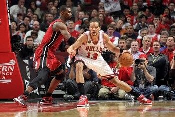 CHICAGO, IL - MAY 26:  Joakim Noah #13 of the Chicago Bulls drives inside against Chris Bosh #1 of the Miami Heat in Game Five of the Eastern Conference Finals during the 2011 NBA Playoffs on May 26, 2011 at the United Center in Chicago, Illinois. The Hea