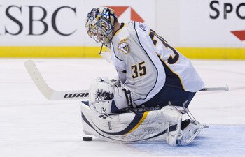 VANCOUVER, CANADA - APRIL 28: Goalie Pekka Rinne #35 of the Nashville Predators makes a save during Game One of the Western Conference Semifinals against the Vancouver Canucks during the 2011 NHL Stanley Cup Playoffs on April 28, 2011 at Rogers Arena in V