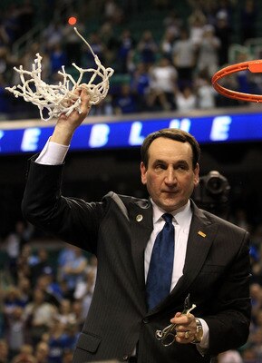 GREENSBORO, NC - MARCH 13:  Head coach Mike Krzyzewski of the Duke Blue Devils cuts down the net after defeating the North Carolina Tar Heels 75-58 in the championship game of the 2011 ACC men's basketball tournament at the Greensboro Coliseum on March 13