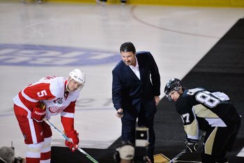 PITTSBURGH - JUNE 02:  Co-Owner and Chairman of the Pittsburgh Penguins Mario Lemieux drops the ceremonial puck for Nicklas Lidstrom #5 of the Detroit Red Wings and Sidney Crosby #87 of the Pittsburgh Penguins before Game Three of the 2009 NHL Stanley Cup