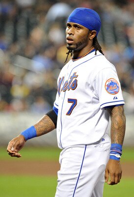 NEW YORK, NY - SEPTEMBER 14: Jose Reyes #7 of the New York Mets reacts after grounding out to end the bottom of the third inning against the Washington Nationals at Citi Field on September 14, 2011 in the Flushing neighborhood of the Queens borough of New