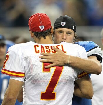 DETROIT, MI - SEPTEMBER 18: Matthew Stafford #9 of the Detroit Lions and Matt Cassel #7 of the Kansas CIty Chiefs exchange greetings after the game at Ford Field on September 18, 2011 in Detroit, Michigan. The Lions defeated the Chiefs 48-3.  (Photo by Le