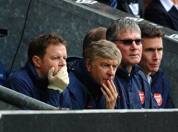 BLACKBURN, ENGLAND - SEPTEMBER 17: Arsene Wenger of Arsenal shows his dissapointment from the bench during the Barclays Premier League match between Blackburn Rovers and Arsenal at Ewood Park on September 17, 2011 in Blackburn, England.  (Photo by Laurenc