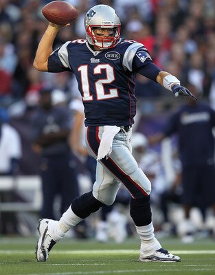 FOXBORO, MA -  SEPTEMBER 18:  Tom Brady #12 of the New England Patriots looks for an open man against the San Diego Chargers in the second half at Gillette Stadium on September 18, 2011 in Foxboro, Massachusetts. (Photo by Jim Rogash/Getty Images)