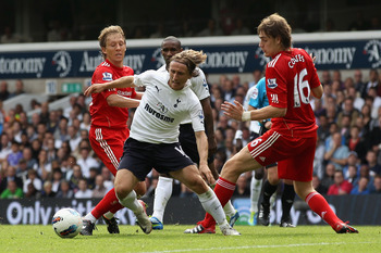 LONDON, ENGLAND - SEPTEMBER 18:  Luka Modric of Tottenham Hotspur controls the ball during the Barclays Premier League match between Tottenham Hotspur and Liverpool at White Hart Lane on September 18, 2011 in London, England.  (Photo by Clive Rose/Getty I