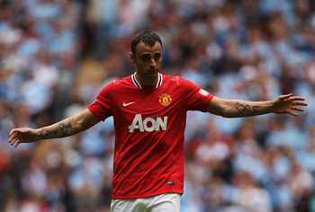 LONDON, ENGLAND - AUGUST 07:  Dimitar Berbatov of Manchester United reacts during the FA Community Shield match sponsored by McDonald's between Manchester City and Manchester United at Wembley Stadium on August 7, 2011 in London, England.  (Photo by Ian W