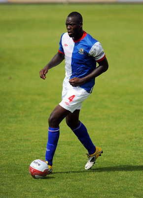 MORECAMBE, UNITED KINGDOM: - JULY 16: Chris Samba of Blackburn Rovers in action during the pre season friendly match between Morecambe and Blackburn Rovers at the Globe Arena on July 16, 2011 in Morecambe, England. (Photo by Clint Hughes/Getty Images)