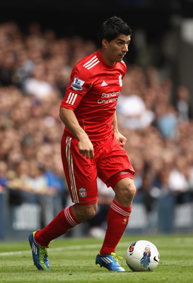 LONDON, ENGLAND - SEPTEMBER 18:  Luis Suarez of Liverpool with the ball during the Barclays Premier League match between Tottenham Hotspur and Liverpool at White Hart Lane on September 18, 2011 in London, England.  (Photo by Clive Rose/Getty Images)