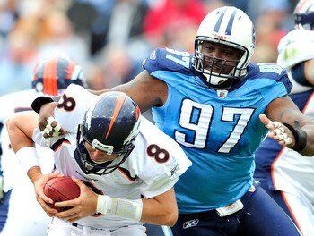 NASHVILLE, TN - OCTOBER 03:  Tony Brown #97 of the Tennessee Titans pressures quarterback Kyle Orton #8 of the Denver Broncos during the first half at LP Field on October 3, 2010 in Nashville, Tennessee.  (Photo by Grant Halverson/Getty Images)