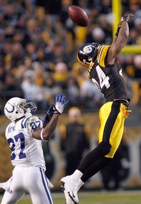 PITTSBURGH - NOVEMBER 9:  Ike Taylor #24 of the Pittsburgh Steelers leaps to deflects the pass to Reggie Wayne #87 of the Indianapolis Colts on November 9, 2008 at Heinz Field in Pittsburgh, Pennsylvania. (Photo by: Rick Stewart/Getty Images)