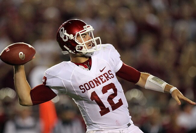 TALLAHASSEE, FL - SEPTEMBER 17:  Landry Jones #12 of the Oklahoma Sooners passes against the Florida State Seminoles at Doak Campbell Stadium on September 17, 2011 in Tallahassee, Florida.  (Photo by Ronald Martinez/Getty Images)