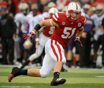 LINCOLN, NE - SEPTEMBER 17: Will Compton #51 of the Nebraska Cornhuskers zeros in on Keith Price #17 of the Washington Huskies during their game at Memorial Stadium September 17, 2011 in Lincoln, Nebraska. Nebraska won 51-38.(Photo by Eric Francis/Getty I