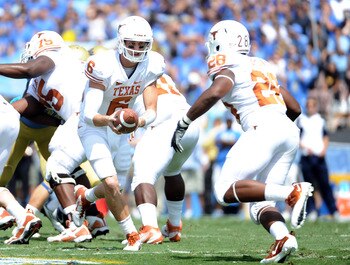 PASADENA, CA - SEPTEMBER 17:  Case McCoy #6 of the Texas Longhorns handsoff to Malcolm Brown #28 of the Texas Longhorns during the first quarter at Rose Bowl on September 17, 2011 in Pasadena, California.  (Photo by Harry How/Getty Images)
