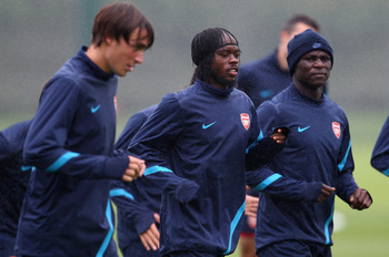 ST ALBANS, ENGLAND - AUGUST 23:  Gervinho (C) with Emmanuel Frimpong (R) and Ignasi Miquel of Arsenal during a training session ahead of their UEFA Champions League Qualifying second leg match against Udinese at London Colney on August 23, 2011 in St Alba