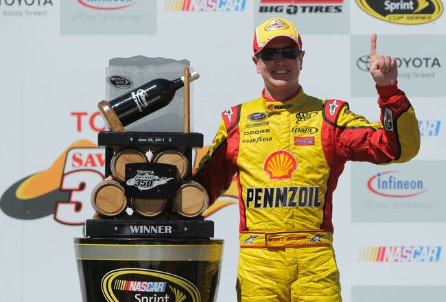 SONOMA, CA - JUNE 26:  Kurt Busch, driver of the #22 Shell/Pennzoil Dodge, celebrates in victory lane after winning the NASCAR Sprint Cup Series Toyota/Save Mart 350 at Infineon Raceway on June 26, 2011 in Sonoma, California.  (Photo by Justin Edmonds/Get