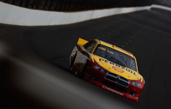 INDIANAPOLIS, IN - JULY 30:  Kurt Busch drives the #22 Shell/Pennzoil Dodge during practice for the NASCAR Sprint Cup Series Brickyard 400 at Indianapolis Motor Speedway on July 30, 2011 in Indianapolis, Indiana.  (Photo by Tom Pennington/Getty Images for