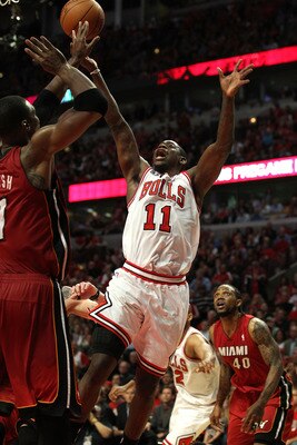 CHICAGO, IL - MAY 26:  Ronnie Brewer #11 of the Chicago Bulls attempts a shot agaisnt the Miami Heat in Game Five of the Eastern Conference Finals during the 2011 NBA Playoffs on May 26, 2011 at the United Center in Chicago, Illinois. NOTE TO USER: User e