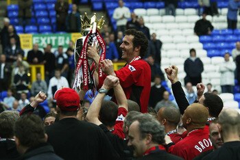 LIVERPOOL - MAY 11:  Laurent Blanc of Manchester United celebrates with the trophy after the FA Barclaycard Premiership match between Everton and Manchester United held on May 11, 2003 at Goodison Park, in Liverpool, England. Manchester United won the mat