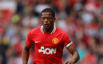 MANCHESTER, ENGLAND - AUGUST 28:  Patrice Evra of Manchester United with the ball during the Barclays Premier League match between Manchester United and Arsenal at Old Trafford on August 28, 2011 in Manchester, England.  (Photo by Alex Livesey/Getty Image