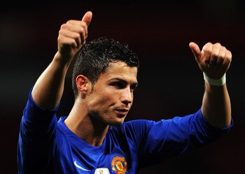 LONDON, ENGLAND - MAY 05:  Cristiano Ronaldo of Manchester United acknowledges the fans after victory in the UEFA Champions League Semi Final Second Leg match between Arsenal and Manchester United at Emirates Stadium on May 5, 2009 in London, England.  (P