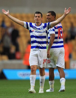 WOLVERHAMPTON, ENGLAND - SEPTEMBER 17:  Joey Barton of Queens Park Rangers celebrates his teams win during the Barclays Premier League match between Wolverhampton Wanderers and Queens Park Rangers at Molineux on September 17, 2011 in Wolverhampton, Englan