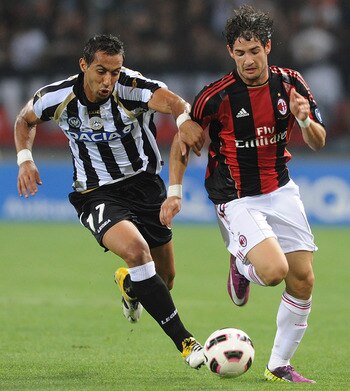UDINE, ITALY - MAY 22:  Amine Benatia of Udinese (L) and Alexandre Pato of AC Milan compete for the ball during the Serie A match between Udinese Calcio and AC Milan  at Stadio Friuli on May 22, 2011 in Udine, Italy.  (Photo by Dino Panato/Getty Images)