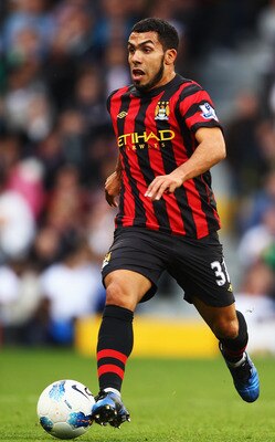 LONDON, ENGLAND - SEPTEMBER 18:  Carlos Tevez of Manchester City runs with the ball during the Barclays Premier League match between Fulham and Manchester City at Craven Cottage on September 18, 2011 in London, England.  (Photo by Julian Finney/Getty Imag