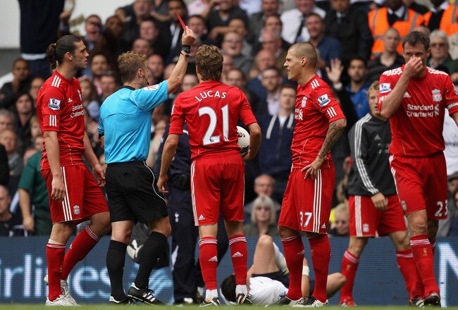 LONDON, ENGLAND - SEPTEMBER 18: Martin Skrtel of Liverpool is shown the red card and is sent off by referee Mike Jones during the Barclays Premier League match between Tottenham Hotspur and Liverpool at White Hart Lane on September 18, 2011 in London, Eng