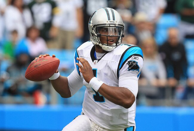 CHARLOTTE, NC - SEPTEMBER 18:  Cam Newton #1 against the Green Bay Packers during their game at Bank of America Stadium on September 18, 2011 in Charlotte, North Carolina.  (Photo by Streeter Lecka/Getty Images)
