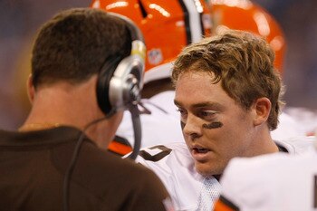 INDIANAPOLIS, IN - SEPTEMBER 18: Colt McCoy #12 of  the Cleveland Browns talks with Pat Shurmur during the game against the Indianapolis Colts at Lucas Oil Stadium on September 18, 2011 in Indianapolis, Indiana. (Photo by Scott Boehm/Getty Images)
