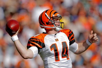 DENVER, CO - SEPTEMBER 18:  Quarterback Andy Dalton #14 of the Cincinnati Bengals throws during the third quarter against the Denver Broncos at Sports Authority Field at Mile High on September 18, 2011 in Denver, Colorado. (Photo by Justin Edmonds/Getty I