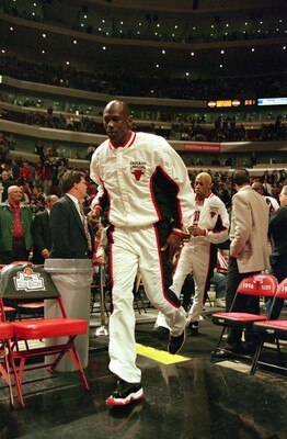 14 May 1996:   Michael Jordan #23 of the Chicago Bulls walking to the court in his warm up suit during the game against the New York Knicks at the United Center in Chicago, Illinois. The Bulls defeated the Knicks 94-81.   NOTE TO USER: It is expressly und