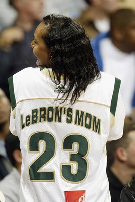 LOS ANGELES - JANUARY 4:  Gloria James, mother of LeBron James #23 of St. Vincent-St. Mary's High School, shows off her own team jersey during the Ninth Annual Pangos Dream Classic game against Mater Dei High School at UCLA's Pauley Pavilion on January 4,