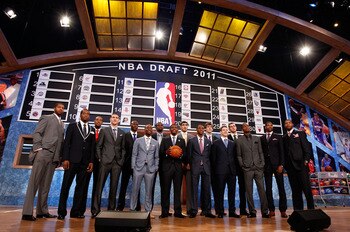 NEWARK, NJ - JUNE 23:  The 2011 Draft class including Kyrie Irving, Derrick Williams, Enes Kanter, Jonas Valanciunas, Brandon Knight, Jimmer Fredette and Kemba Walker pose for a group photo during the 2011 NBA Draft at the Prudential Center on June 23, 20