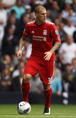 LONDON, ENGLAND - SEPTEMBER 18:  Martin Skrtel of Liverpool with the ball during the Barclays Premier League match between Tottenham Hotspur and Liverpool at White Hart Lane on September 18, 2011 in London, England.  (Photo by Clive Rose/Getty Images)