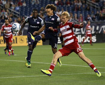 FOXBORO, MA - SEPTEMBER 10:  Kevin Alston #30 of the New England Revolution defends against Brek Shea #20 of the FC Dallas at Gillette Stadium on September 10, 2011 in Foxboro, Massachusetts. (Photo by Jim Rogash/Getty Images)