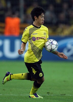 DORTMUND, GERMANY - SEPTEMBER 13:  Shinji Kagawa of Borussia Dortmund in action during the UEFA Champions League Group F match between Borussia Dortmund and Arsenal FC at Signal Iduna Park on September 13, 2011 in Dortmund, Germany.  (Photo by Ian Walton/