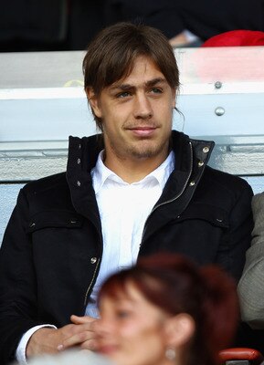 LIVERPOOL, ENGLAND - AUGUST 27:  New Liverpool signing Sebastian Coates looks on ahead of the the Barclays Premier League match between Liverpool and Bolton Wanderers at Anfield on August 27, 2011 in Liverpool, England.  (Photo by Clive Brunskill/Getty Im