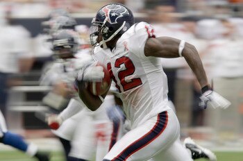 HOUSTON, TX - SEPTEMBER 11: Jacoby Jones #12 of the Houston Texans returns a punt return for 80 yards against the Indianapolis Colts for a touchdown on September 11, 2011 at Reliant Stadium in Houston, Texas. Texans won 34 to 7. (Photo by Thomas B. Shea/G