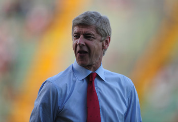UDINE, ITALY - AUGUST 24:  Arsenal manager Arsene Wenger looks on during the UEFA Champions League play-off second leg match between Udinese Calcio and Arsenal FC at the Stadio Friuli on August 24, 2011 in Udine, Italy.  (Photo by Jamie McDonald/Getty Ima
