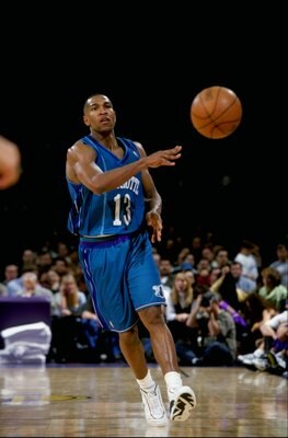 16 Feb 1999: Bobby Phills #13 of the Charlotte Hornets passes the ball during the game against the Los Angeles Lakers at the Great Western Forum in Inglewood, California. The Lakers defeated the Hornets 116-88.